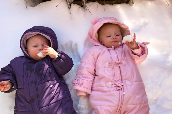 Colin and Addison in their snowsuits.