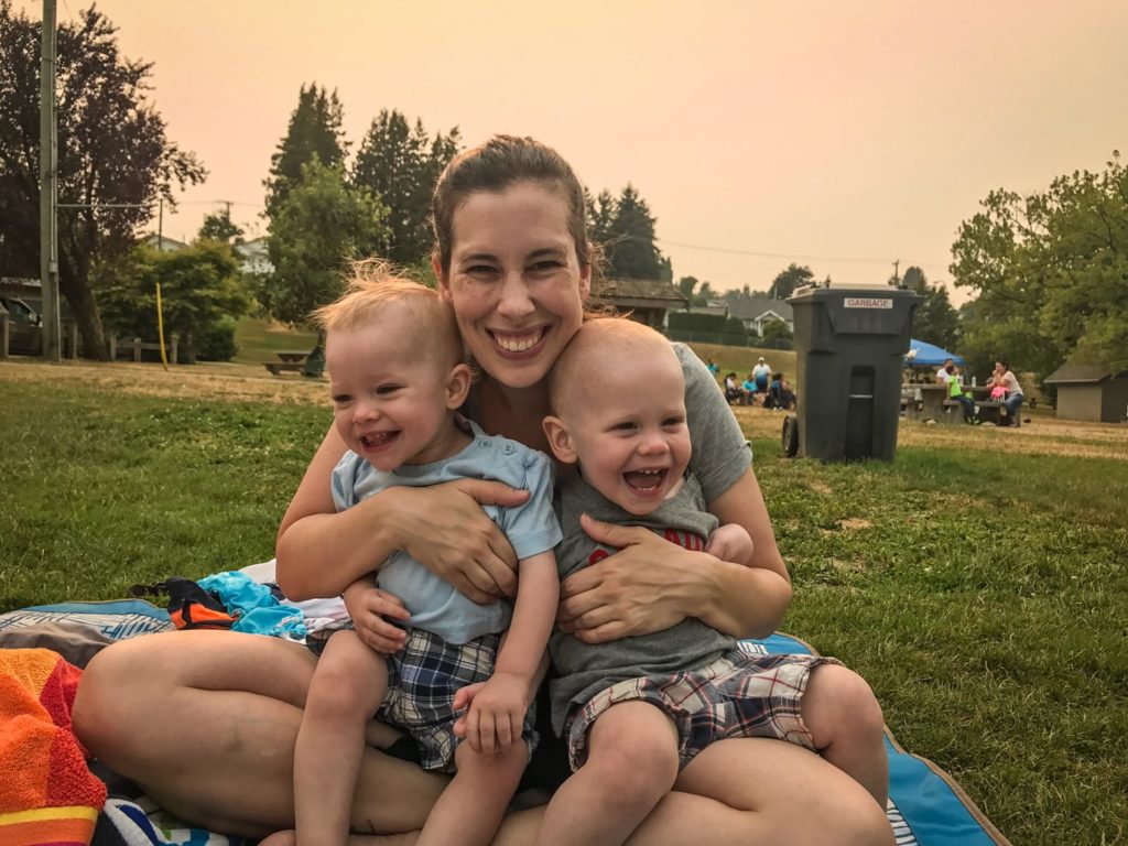 Mom and the kids at the splashpark.